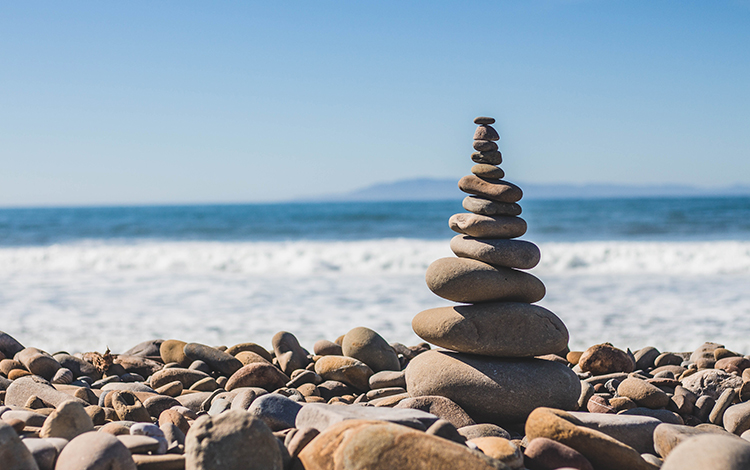 Balancing rocks on shore